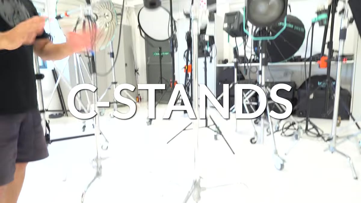 C-stand with grip arm and mini boom arm attachment