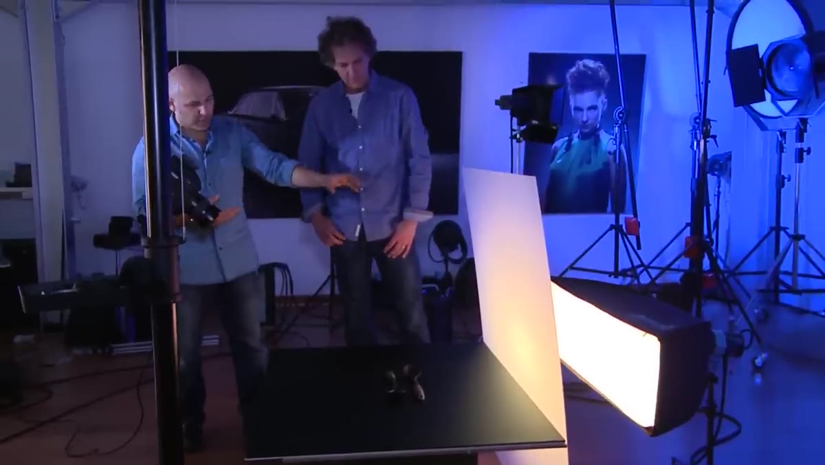 Single softbox positioned behind spoons, light firing through perspex sheet