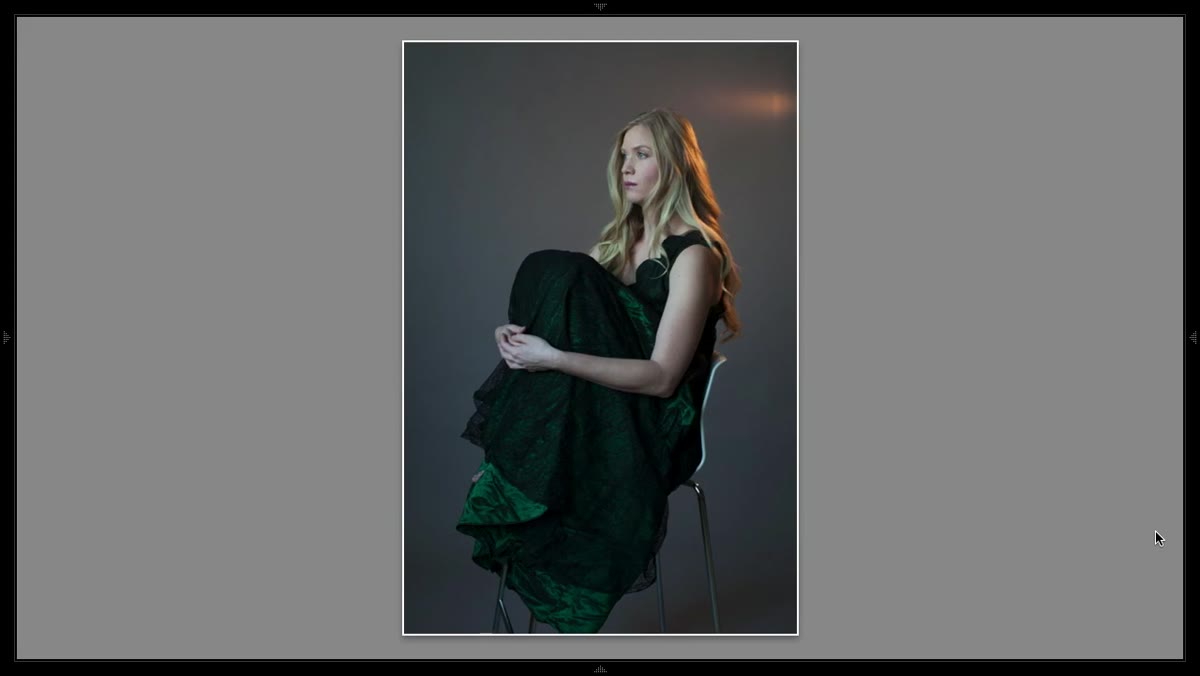 Light repositioned to opposite side of subject, assessing brightness