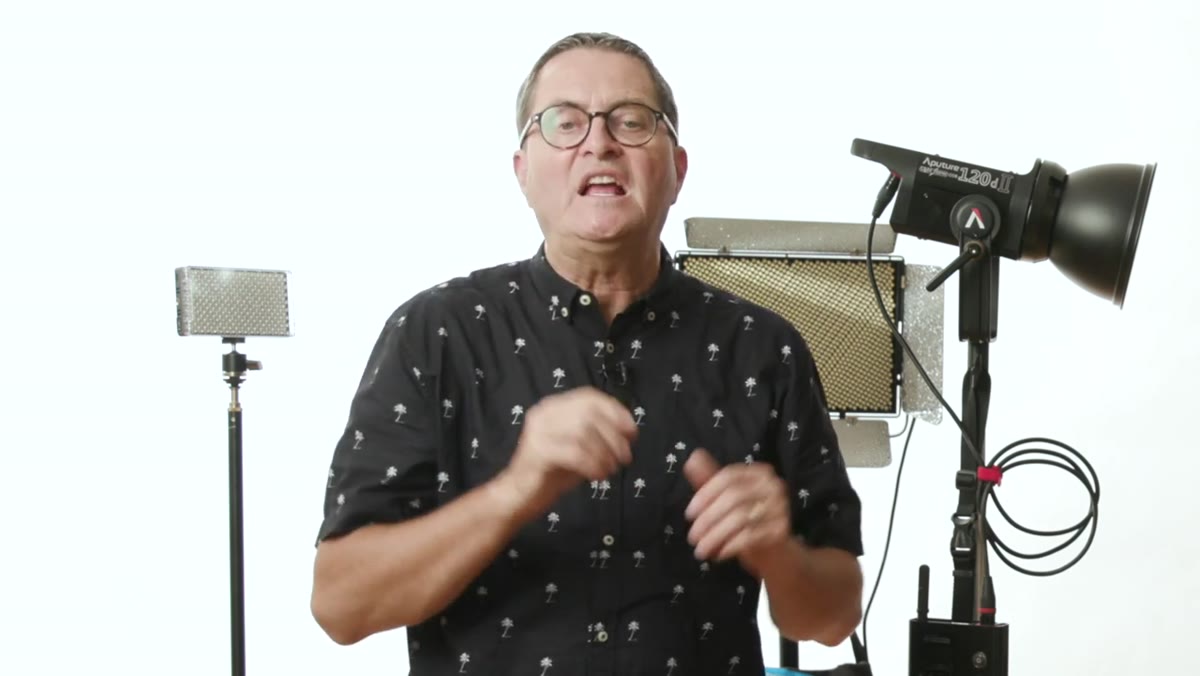 Tungsten and LED continuous light sources on studio stands
