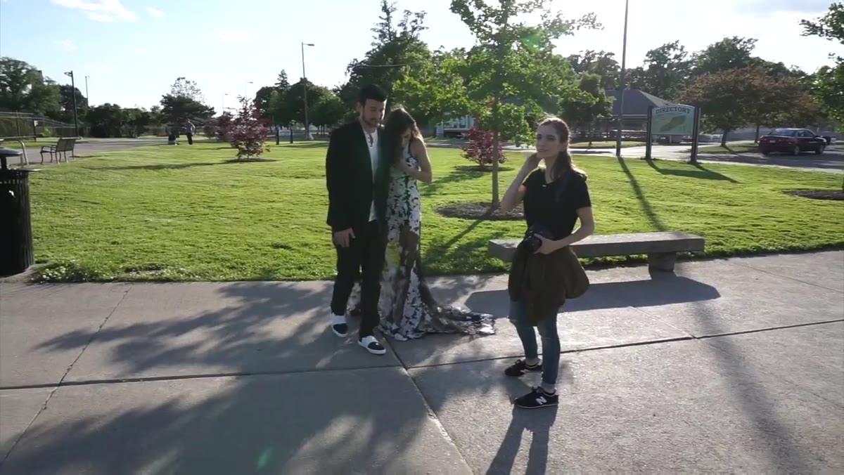 Couple walking slowly toward camera in natural light