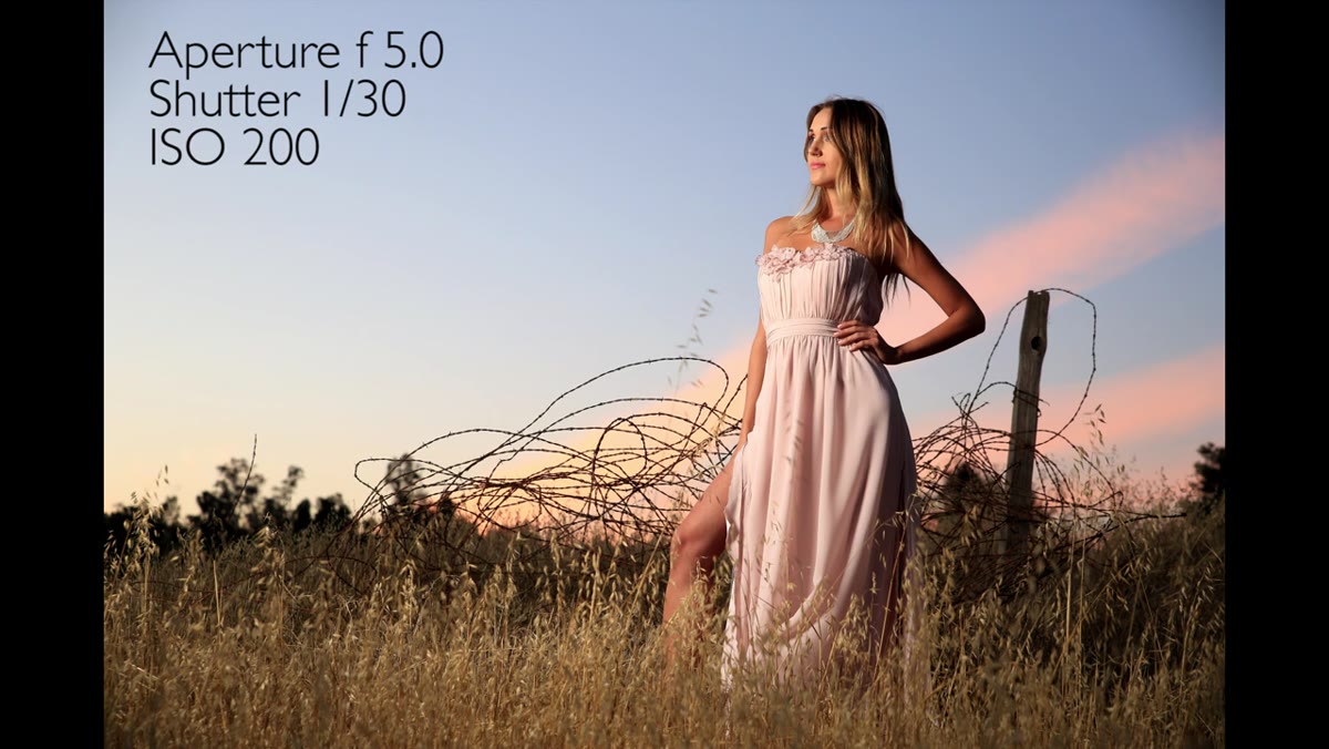 Softbox tilting upward to remove light from ground and lower body