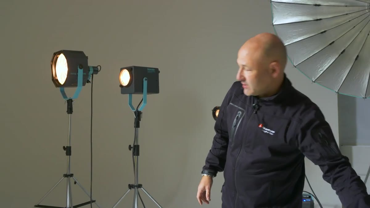 Pico light compact head shown next to standard studio head