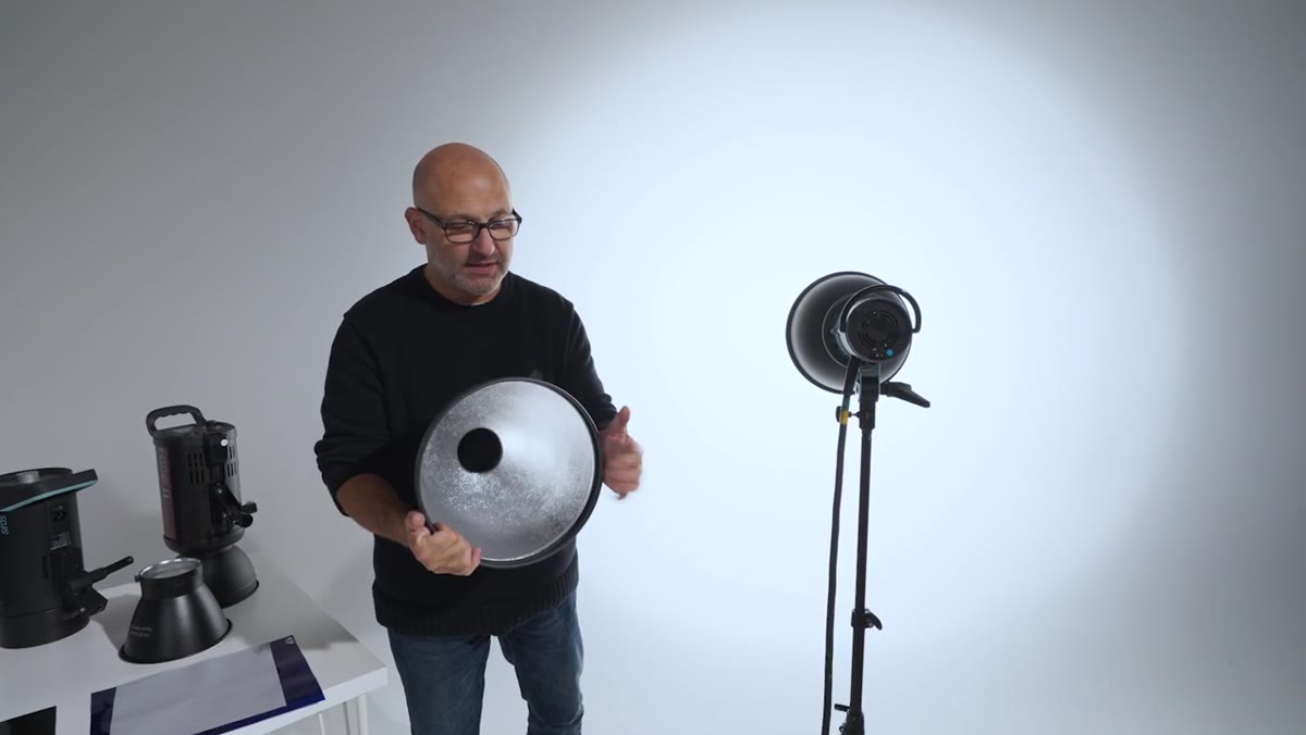 P65 reflector shown next to P70, comparing physical depth and light spread