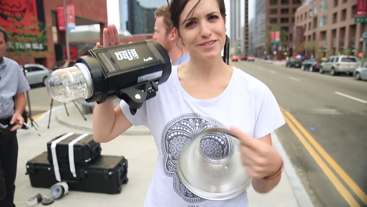 Jay P Morgan adjusting strobe power output on location