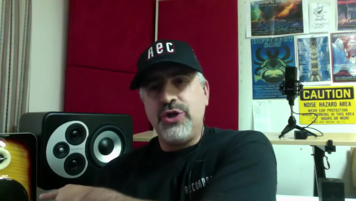 Metlay describing the reference monitors and studio gear on his desk