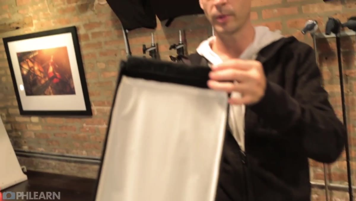 Softboxes attached to wall strip with Velcro fasteners