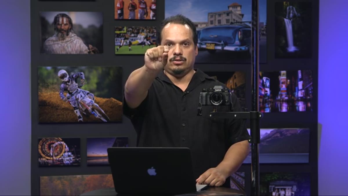 Hands demonstrating nose and ear grip gestures for directing head position
