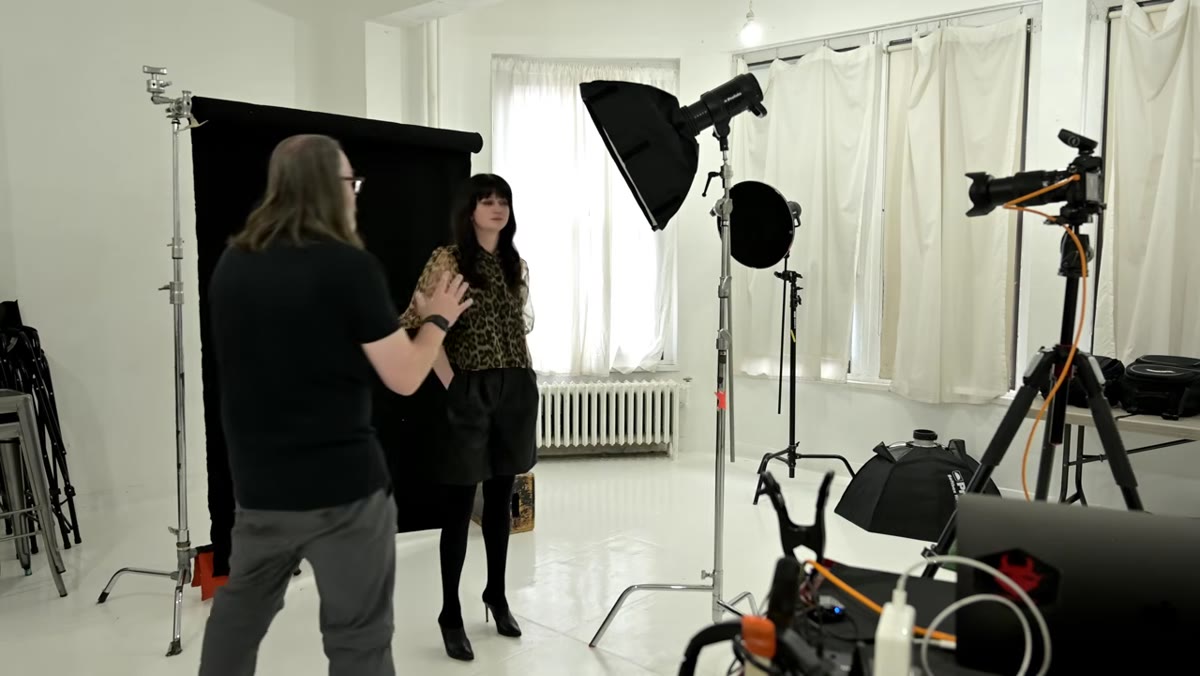 Daniel standing near softbox to feel where light originates