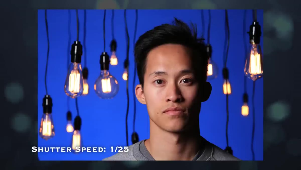 Final hero frame showing subject with balanced background bulbs