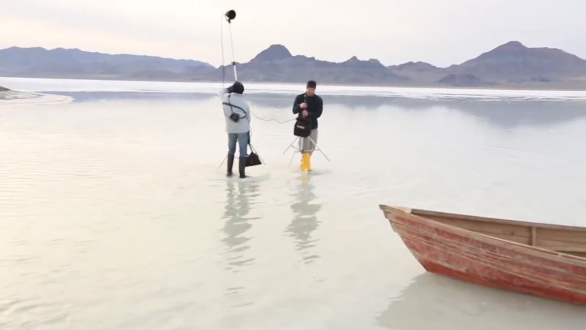 Strobe positioned camera-left with softbox over water