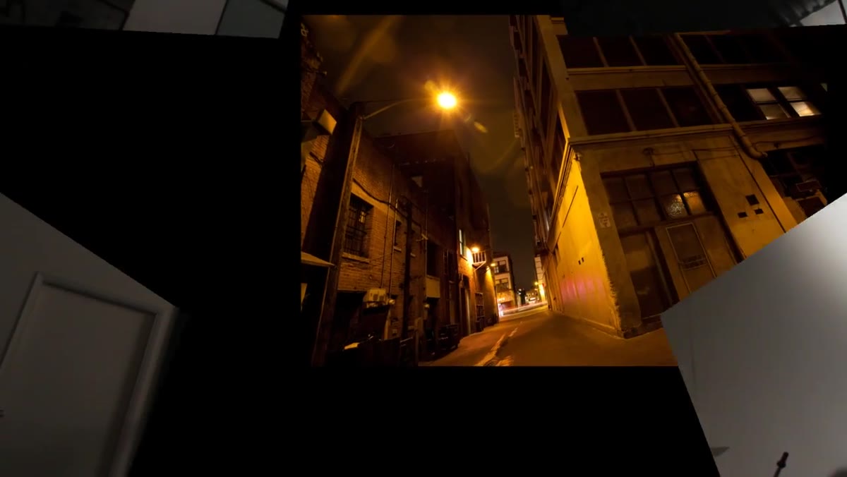 Dark gritty alley location with warm street light visible