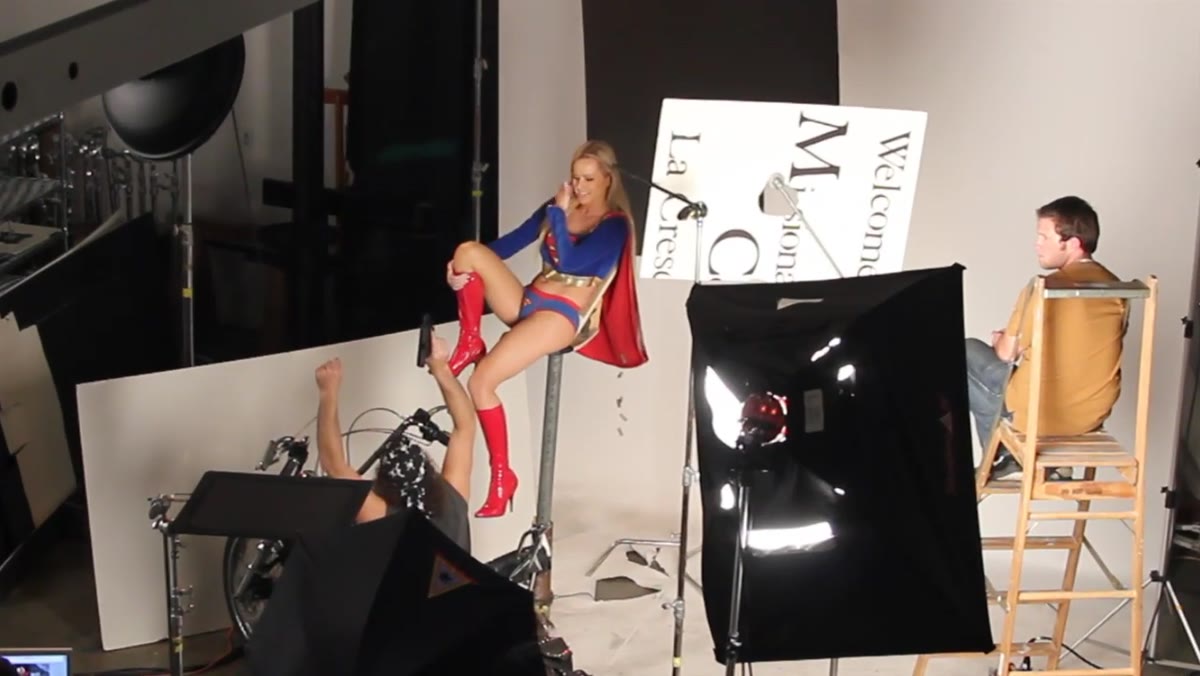 Key light positioned high camera left with CTO gel on reflector head
