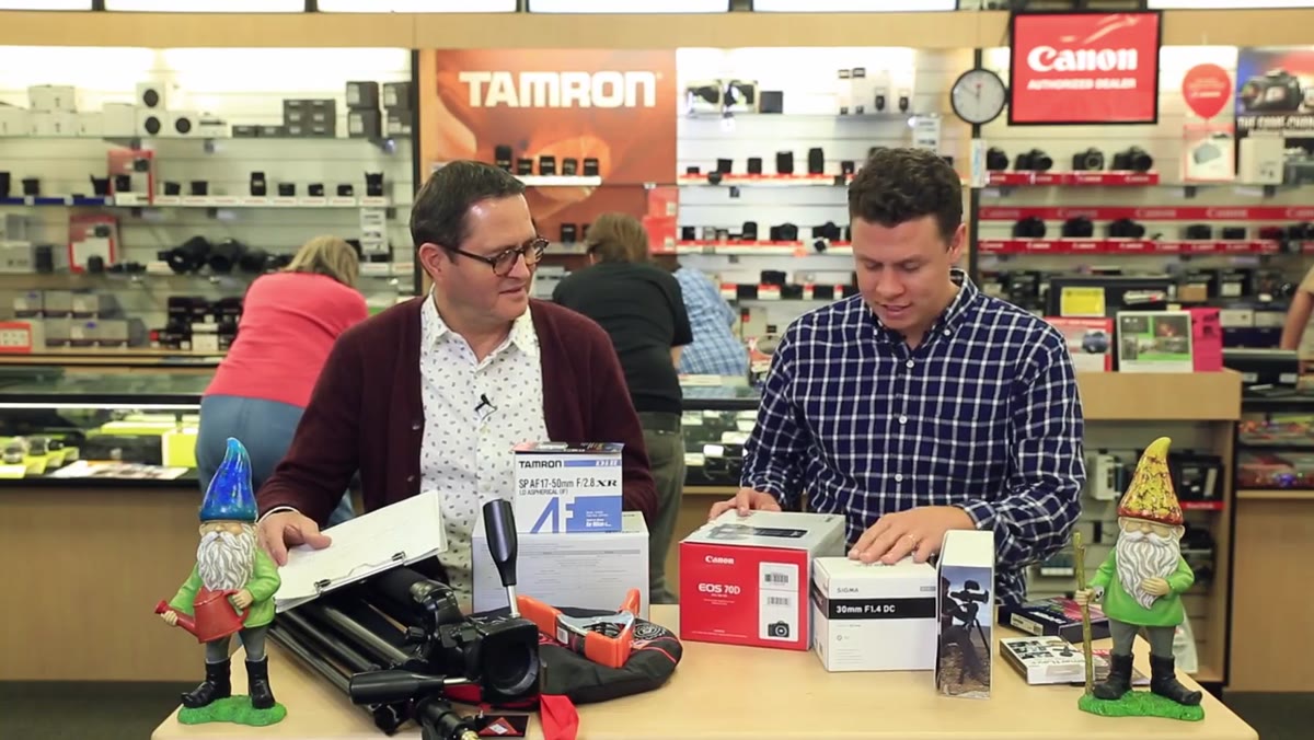 Host presenting the Canon 70D with flip-out touchscreen for video work