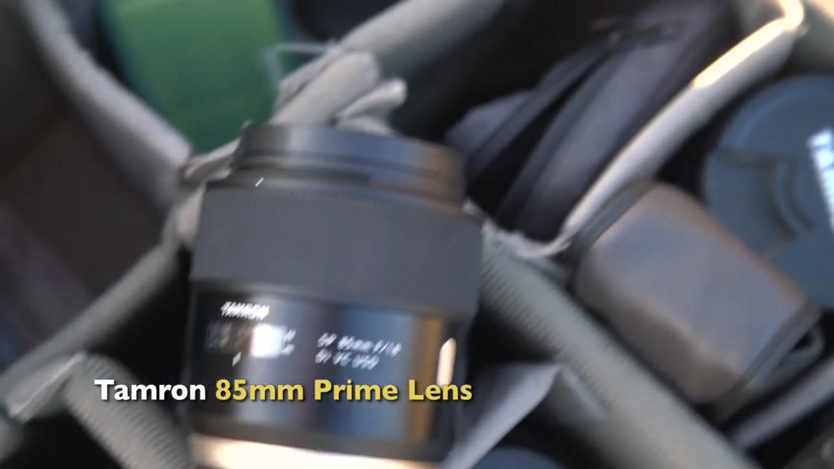 Tamron 85mm lens mounted on camera body