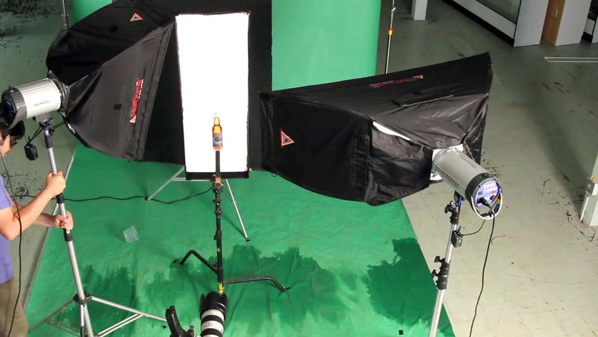 Small strip box on camera left lighting bottle neck and label edge