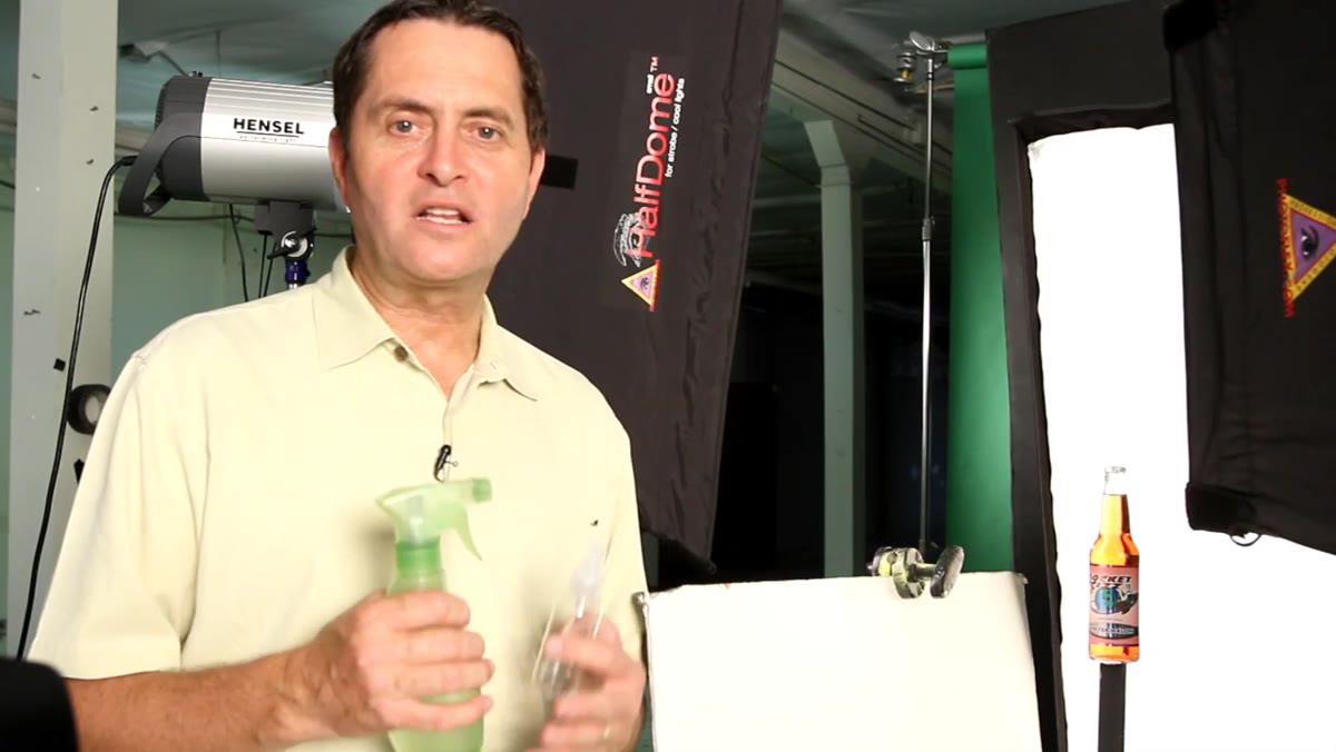 Spritzer bottle with glycerin mixture being applied to bottle surface