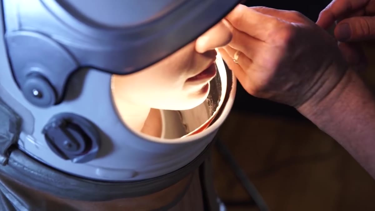 LED tape strip being placed along the bottom inner edge of the helmet