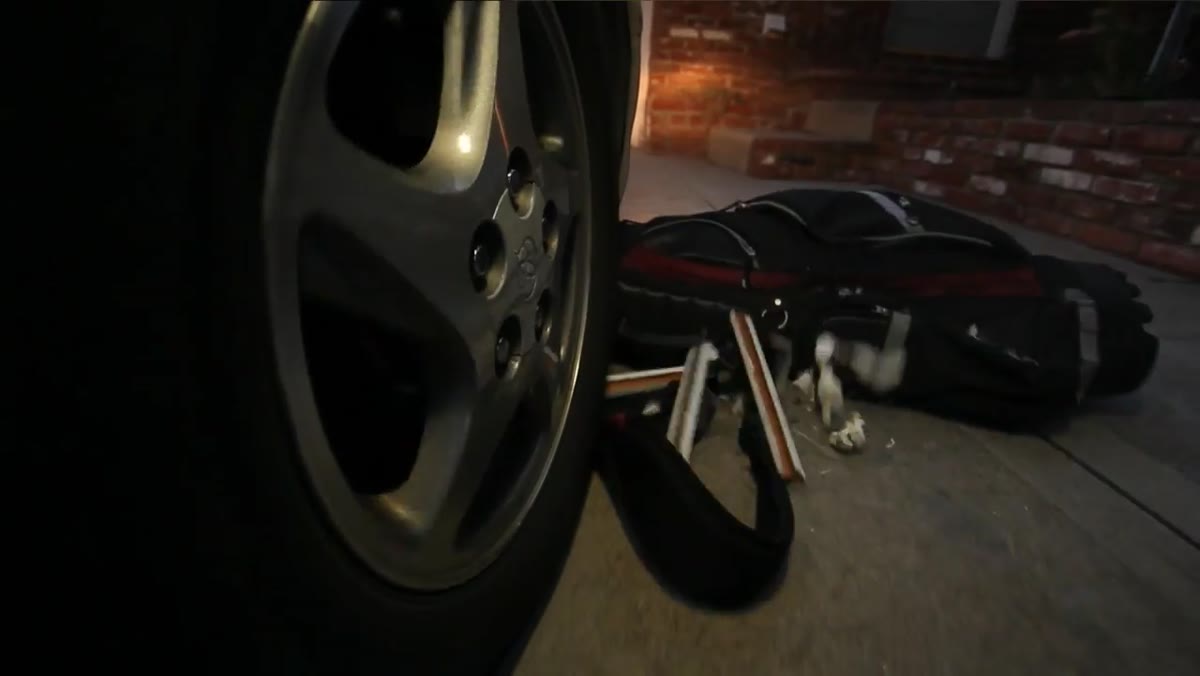 Camera and LED suction-cupped to car wheel well