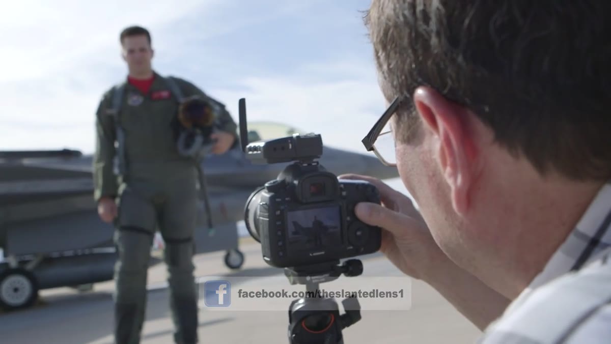 Photographer assessing the F-16&rsquo;s position on the tarmac