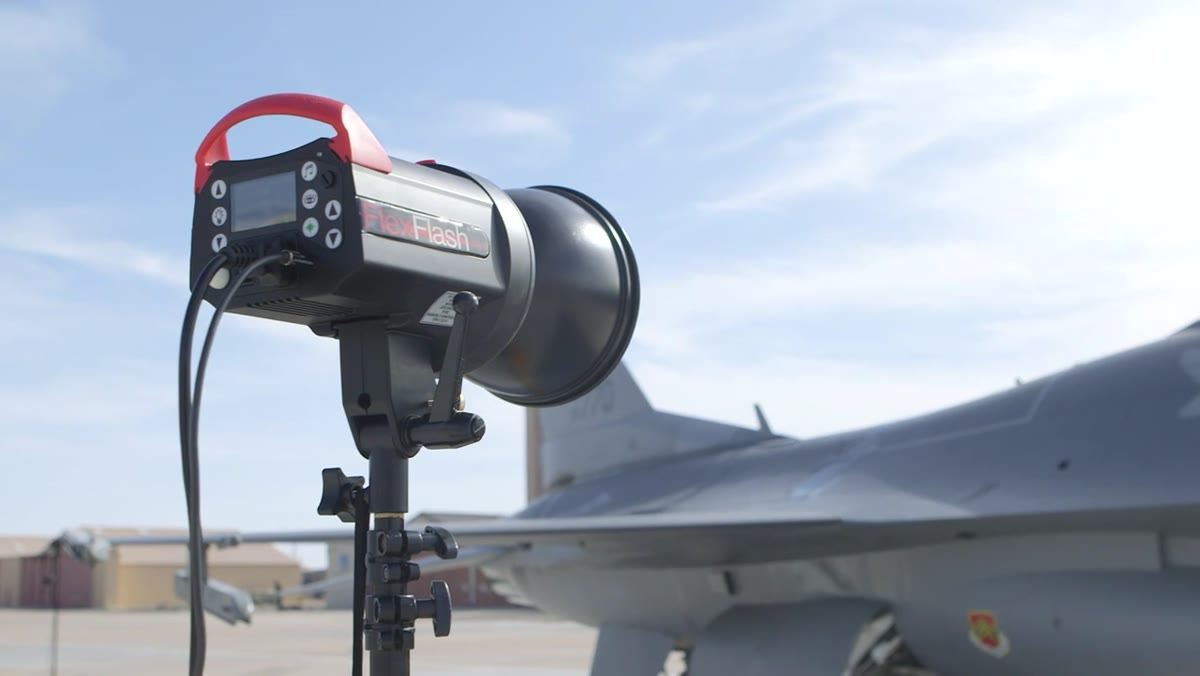 FlexFlash with reflector placed camera right for midsection