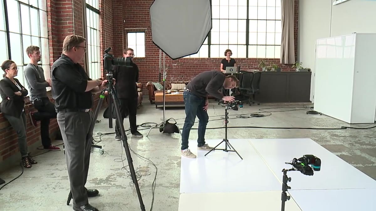 Flash units being configured via radio triggers on set