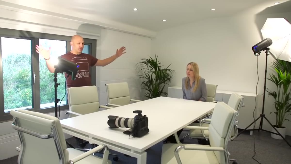 Small meeting room with chairs and compact table visible