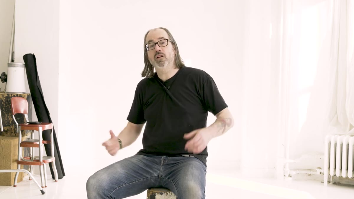 Norton walking toward camera position, demonstrating where to meter