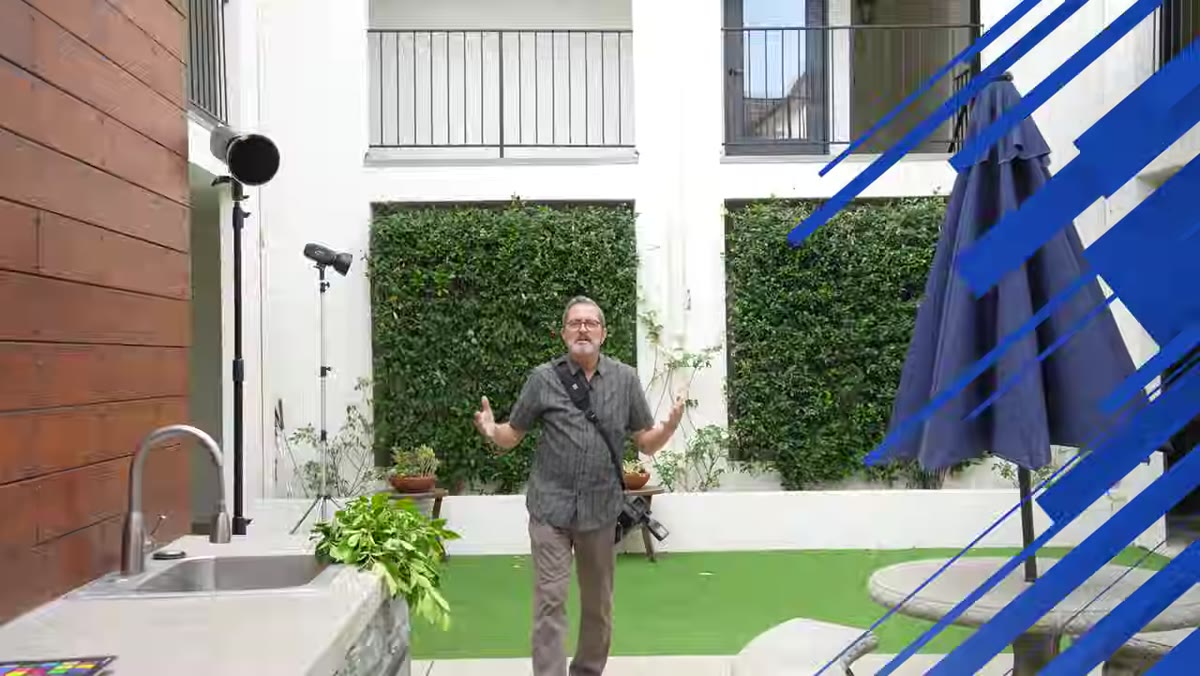 Jay standing in courtyard assessing available background