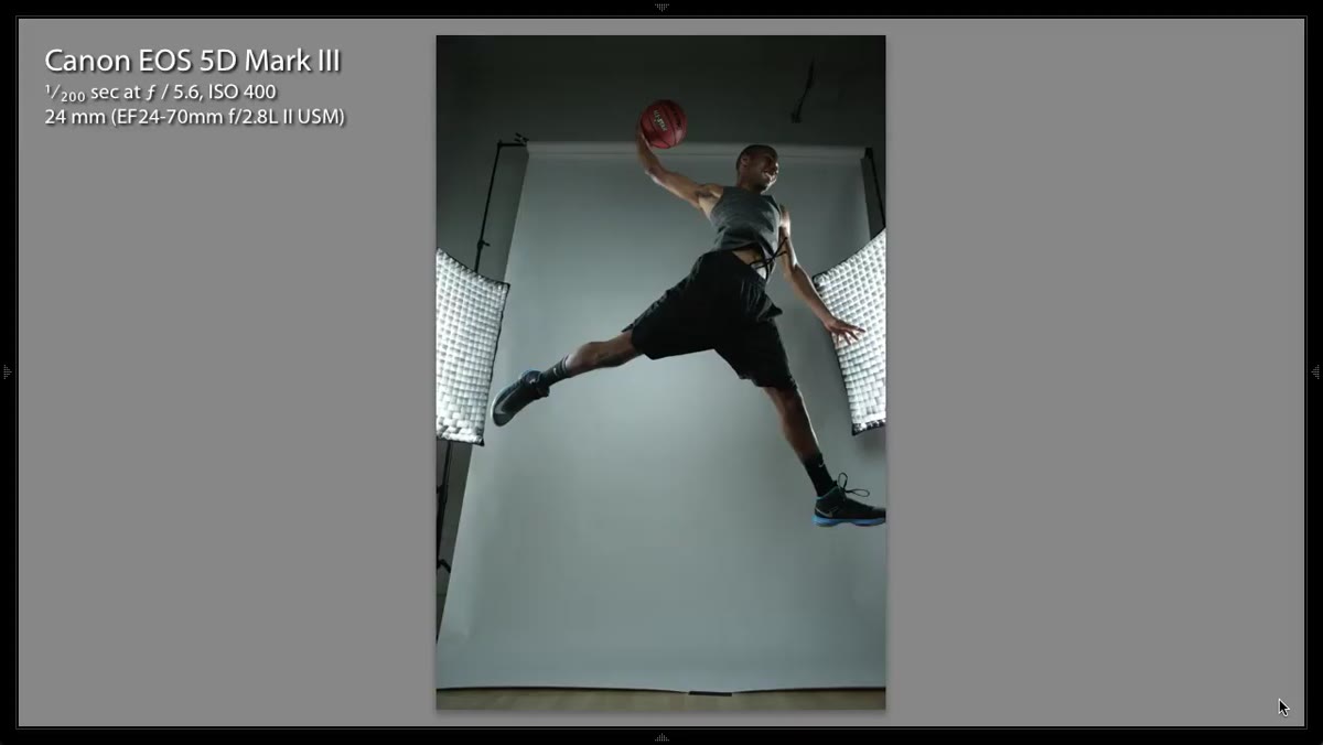 Grimes reviewing LCD, noting trimmed foot at frame edge