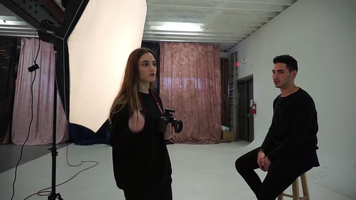 Photographer giving emotional direction to subject