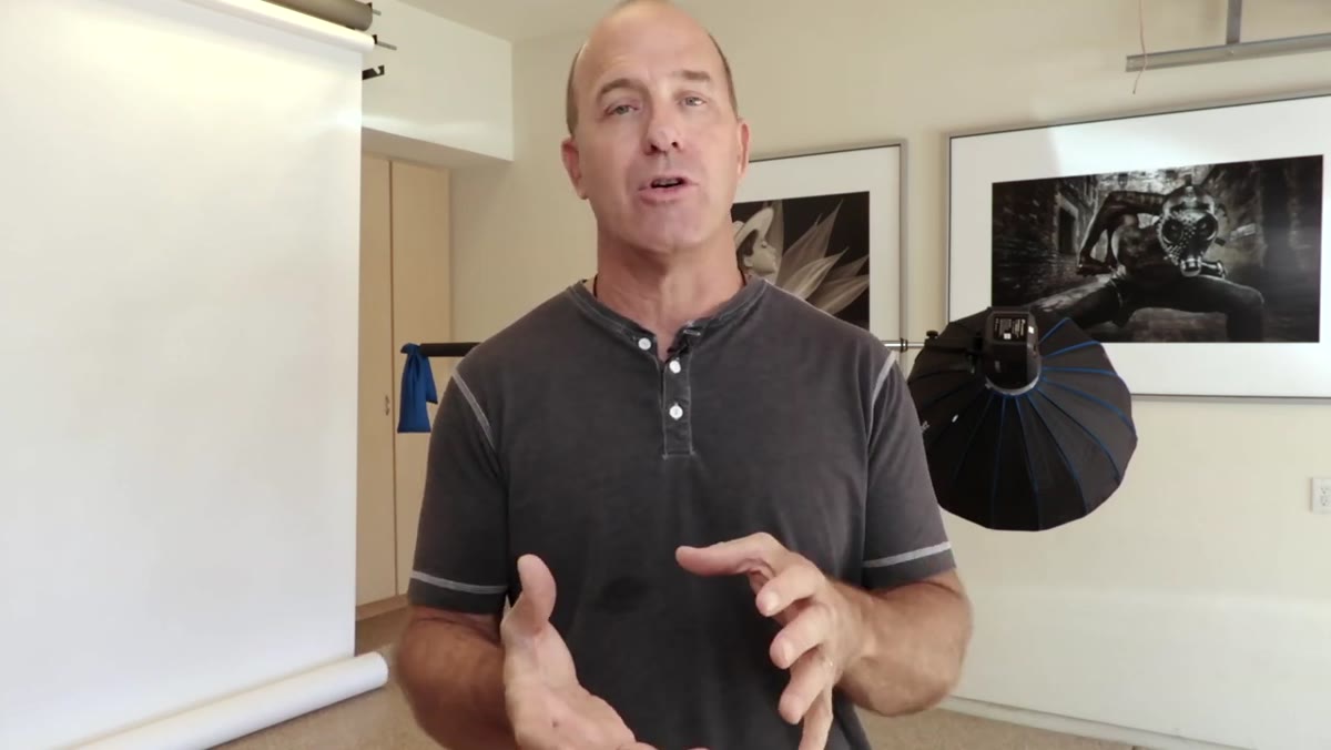 Strobe and modifier mounted on boom, visibly spinning