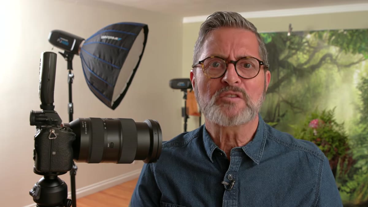 JP discussing lens choice on set with toddler subject