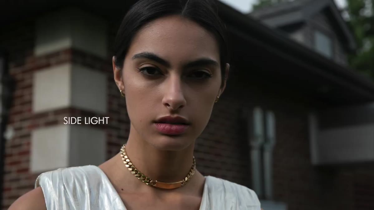 Side-lit shot showing even, flattering light on model&rsquo;s face