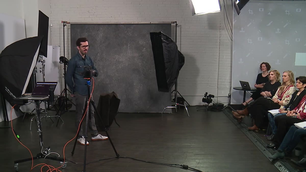 Studio setting demonstrating deliberate exposure control over subject and background