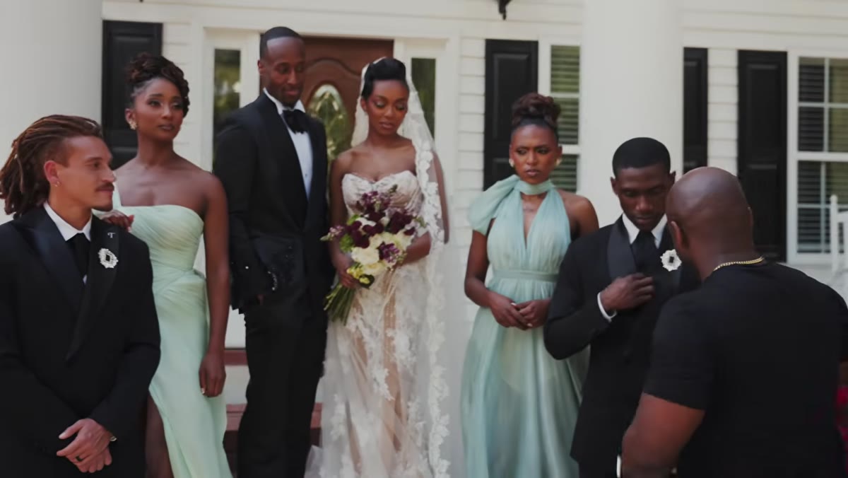 Two groomsmen with different hand placements to avoid symmetry