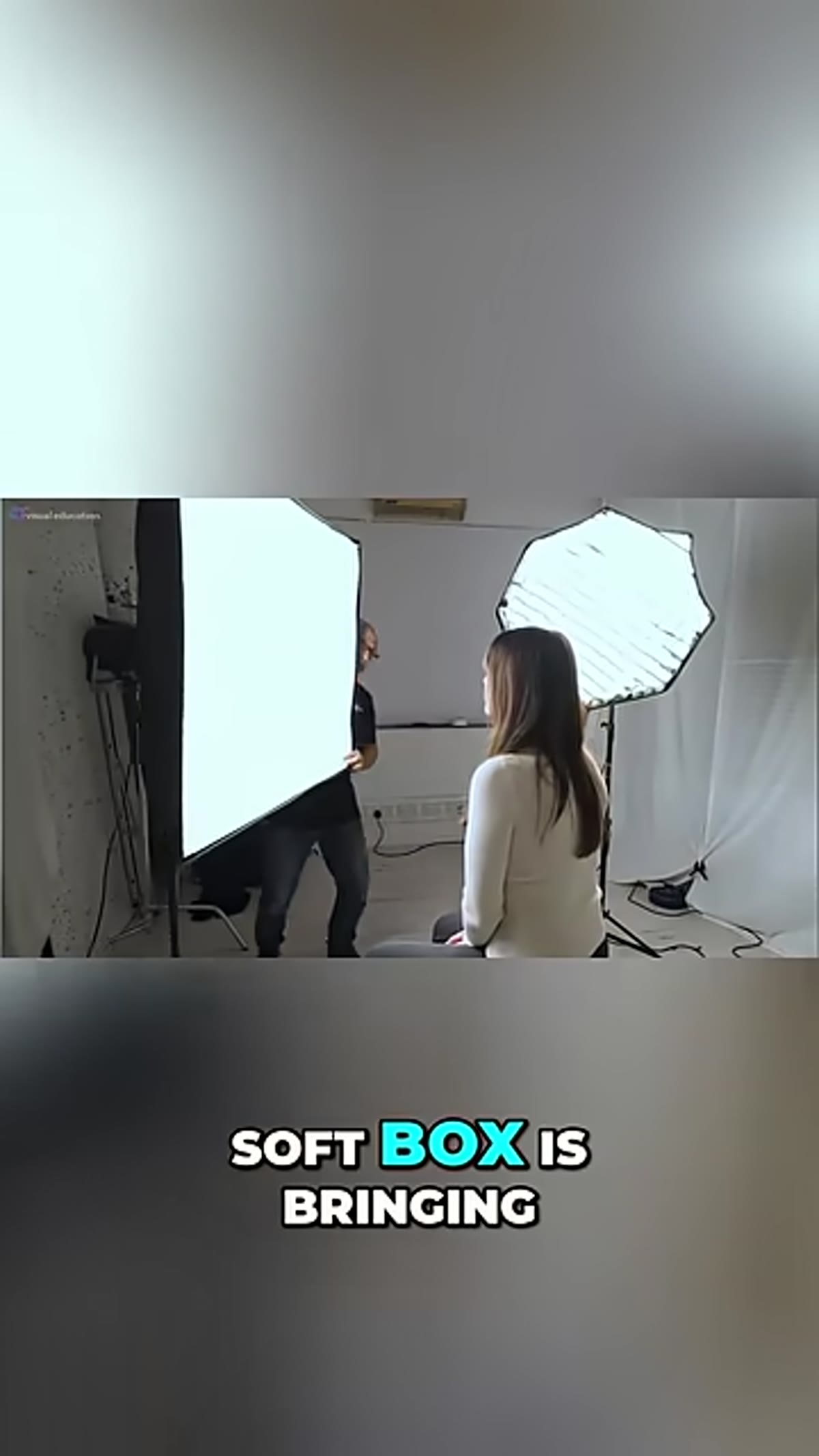 Softbox being moved significantly closer toward the subject