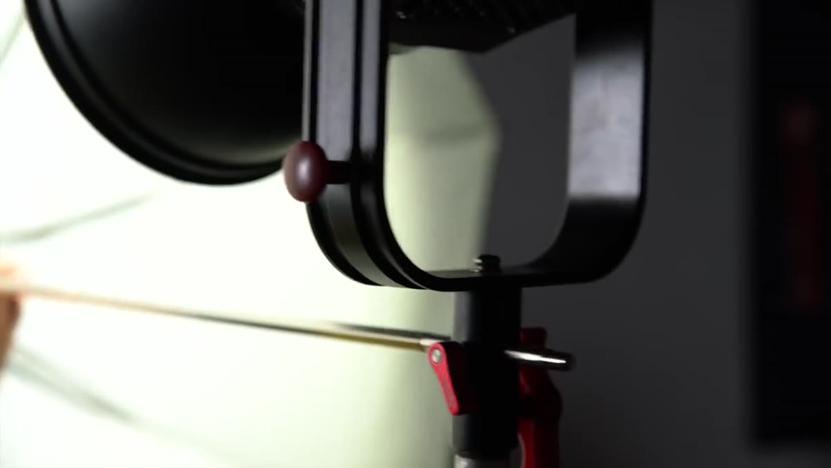 Large shoot-through umbrella mounted on LED unit