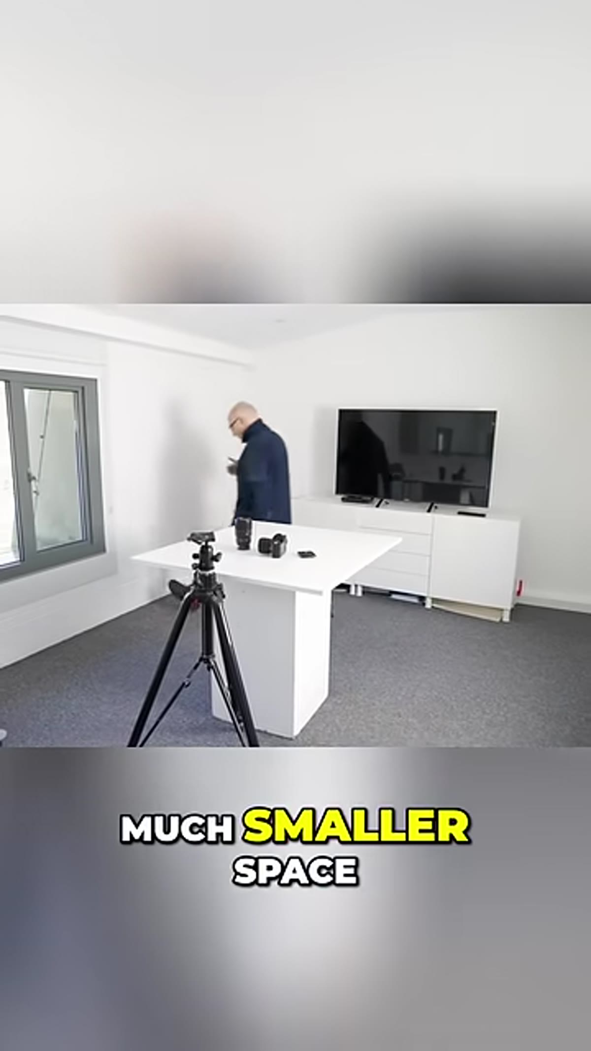 Small studio showing subject and background as two distinct lighting zones