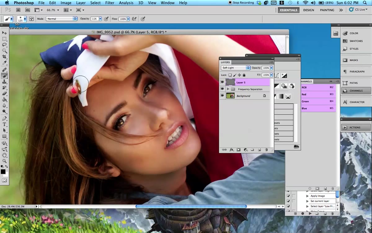 Black brush strokes applied over darker facial areas