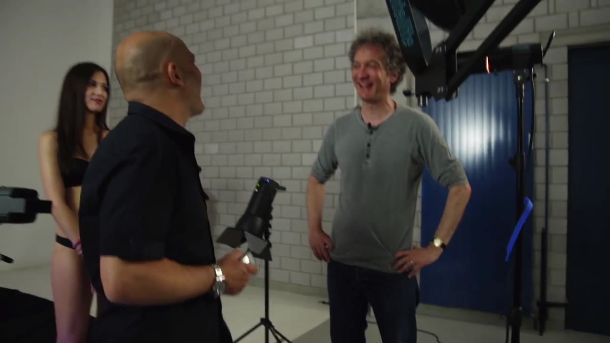 Assistant repositioning Pico light as model changes pose