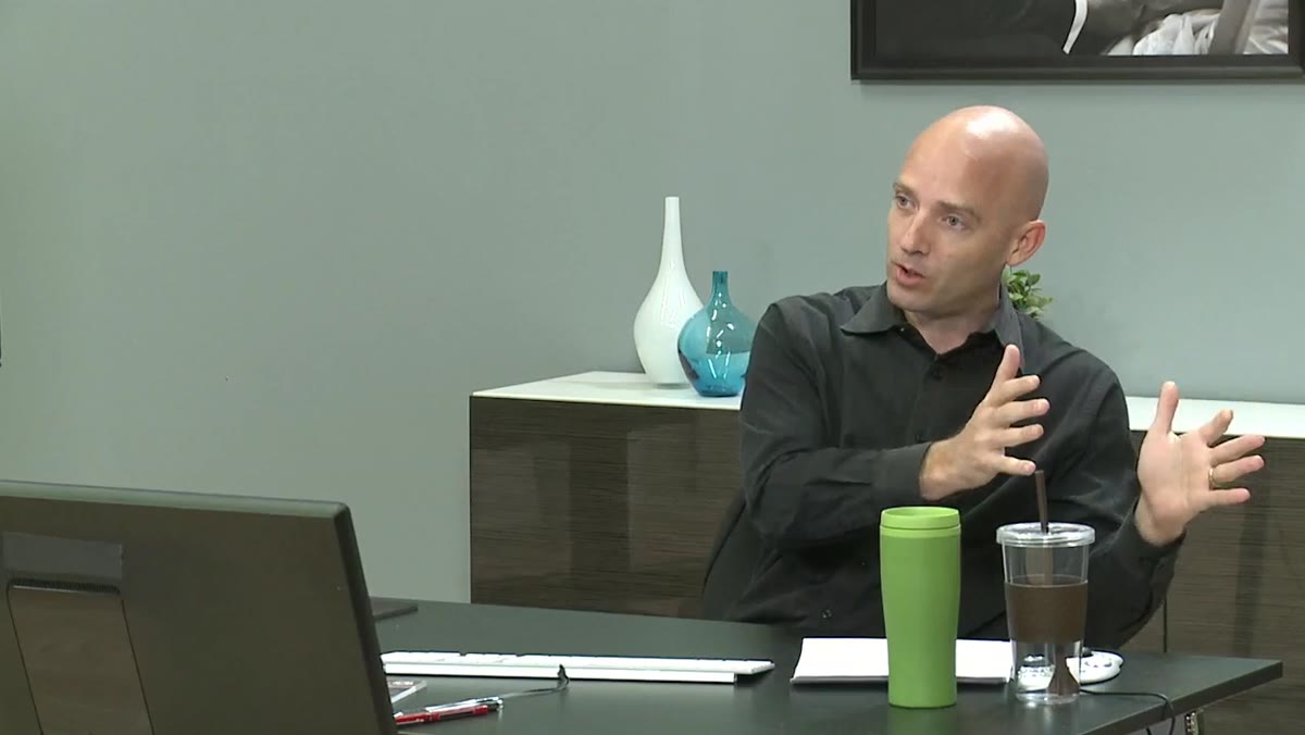 Platt explaining the concept of following an image from shoot to post-production