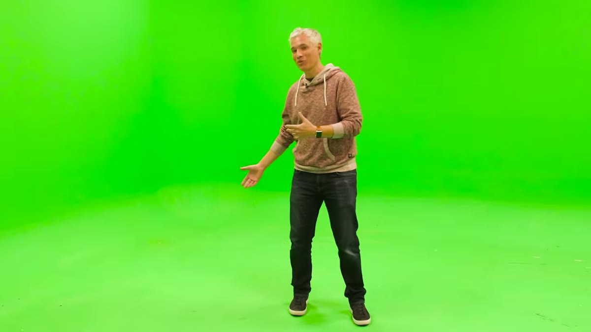 Green-painted cyclorama room visible adjacent to white cyc