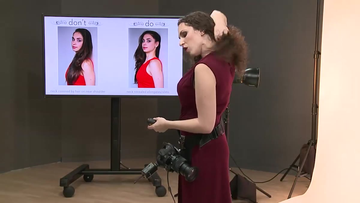 Hair removed from near shoulder, elongating subject&rsquo;s neck