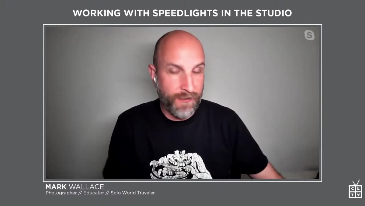 Two different brand speedlights shown side by side on a table