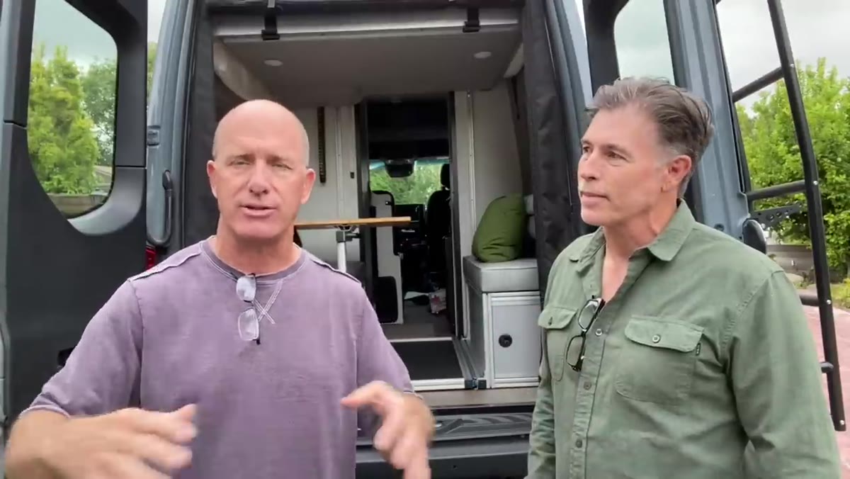 Large Think Tank rolling case being described inside the van
