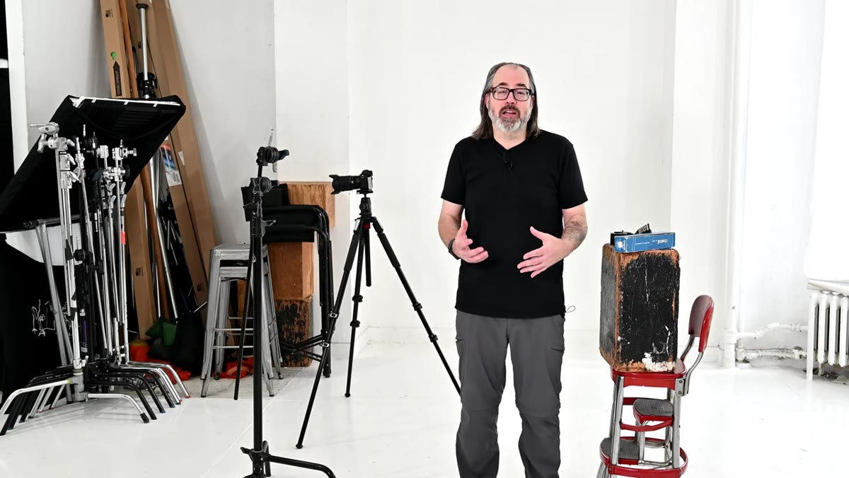 Daniel Norton holding assorted grip items explaining the category