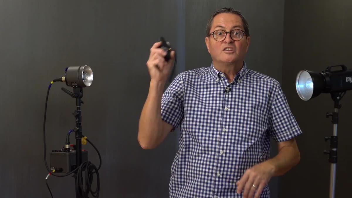 Radio trigger transmitter mounted on camera hot shoe