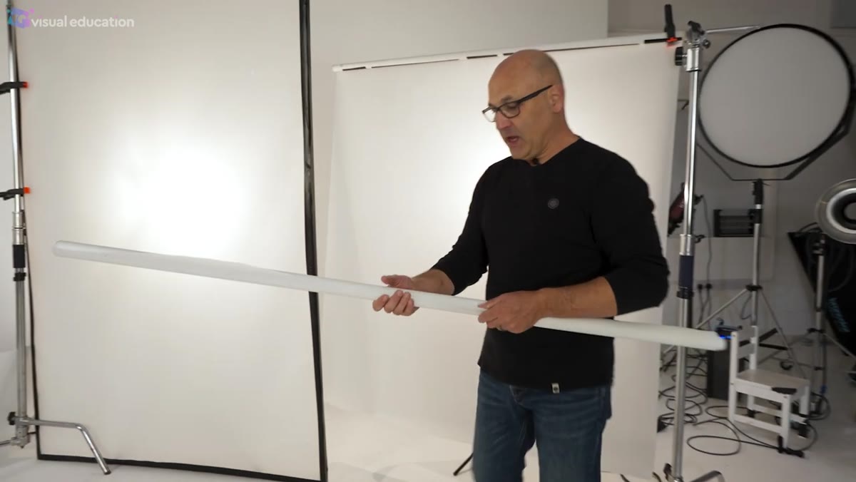 Kyle holding a roll of Lee 216 diffusion material