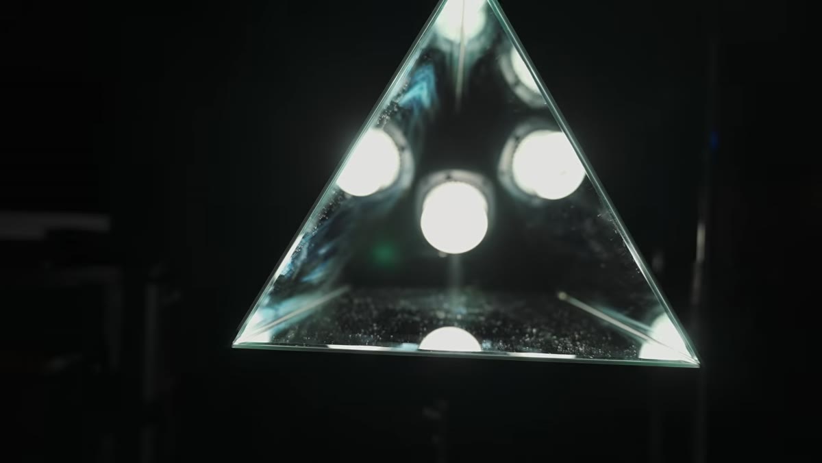 Three mirrors gaffer-taped into triangular prism shape
